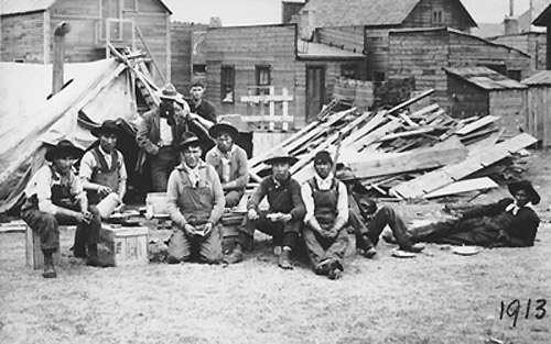 Rivermen and boatbuilders at a construction camp