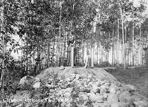 Nellie Young at water pump, Athabasca Landing, 1912