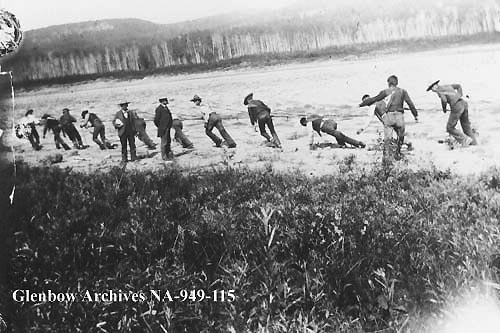 Tracking up the Athabasca River, Alberta, 1899.