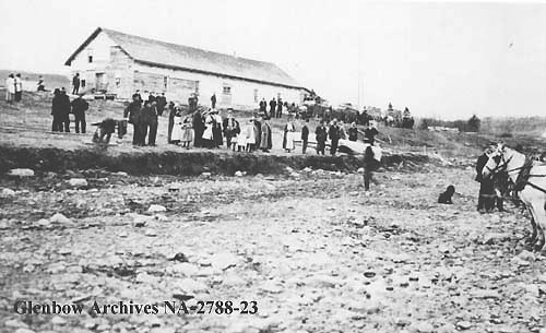 Crowd on beach, Athabasca Landing, Alberta. 1911